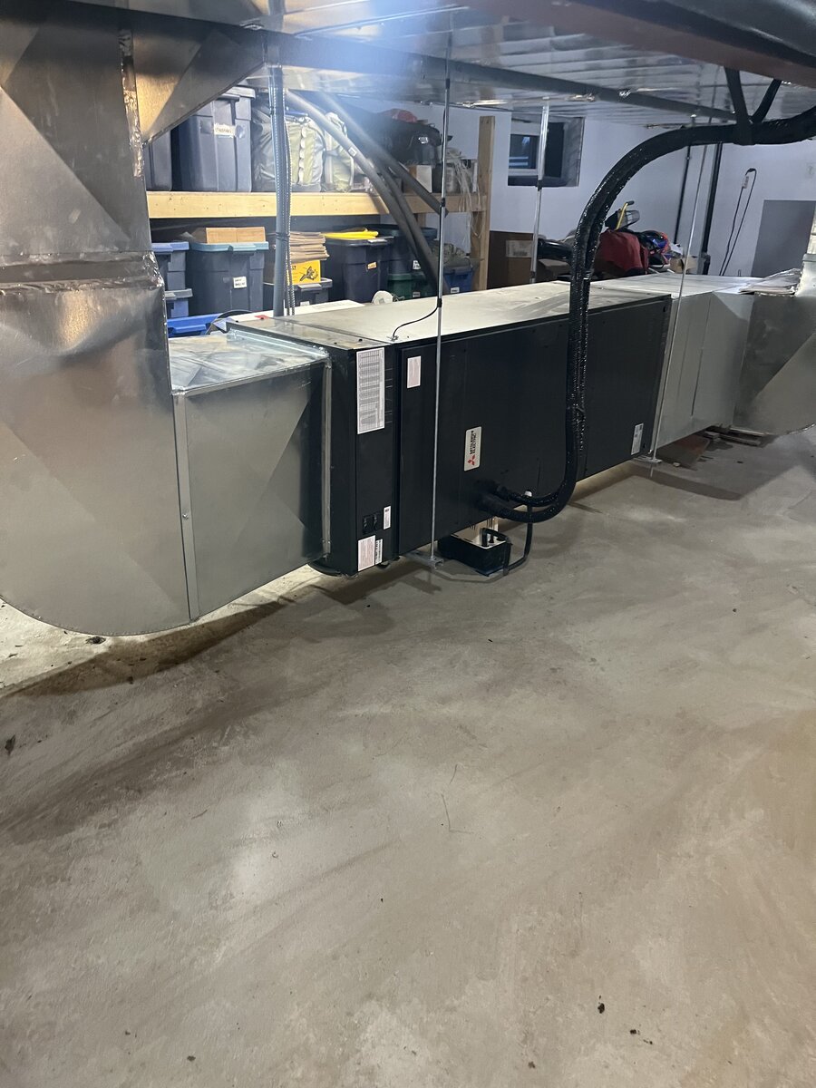 Mitsubishi Electric horizontal air handler with ductwork installed in basement