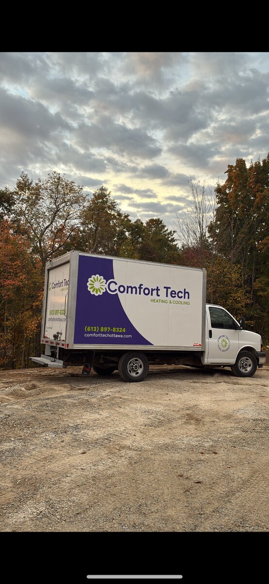 Comfort Tech Heating and Cooling branded truck in autumn setting