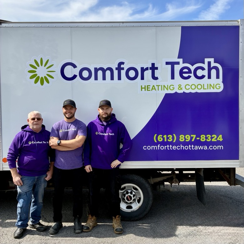 Comfort Tech Ottawa service team standing beside branded work truck